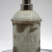 Analyze the image and draft me SEO Alt test, title, caption and description for ORY Skincare website: Personalize My Lotion Bottle page - ORY Two-Tone Leaf Botanical Glass Bottle