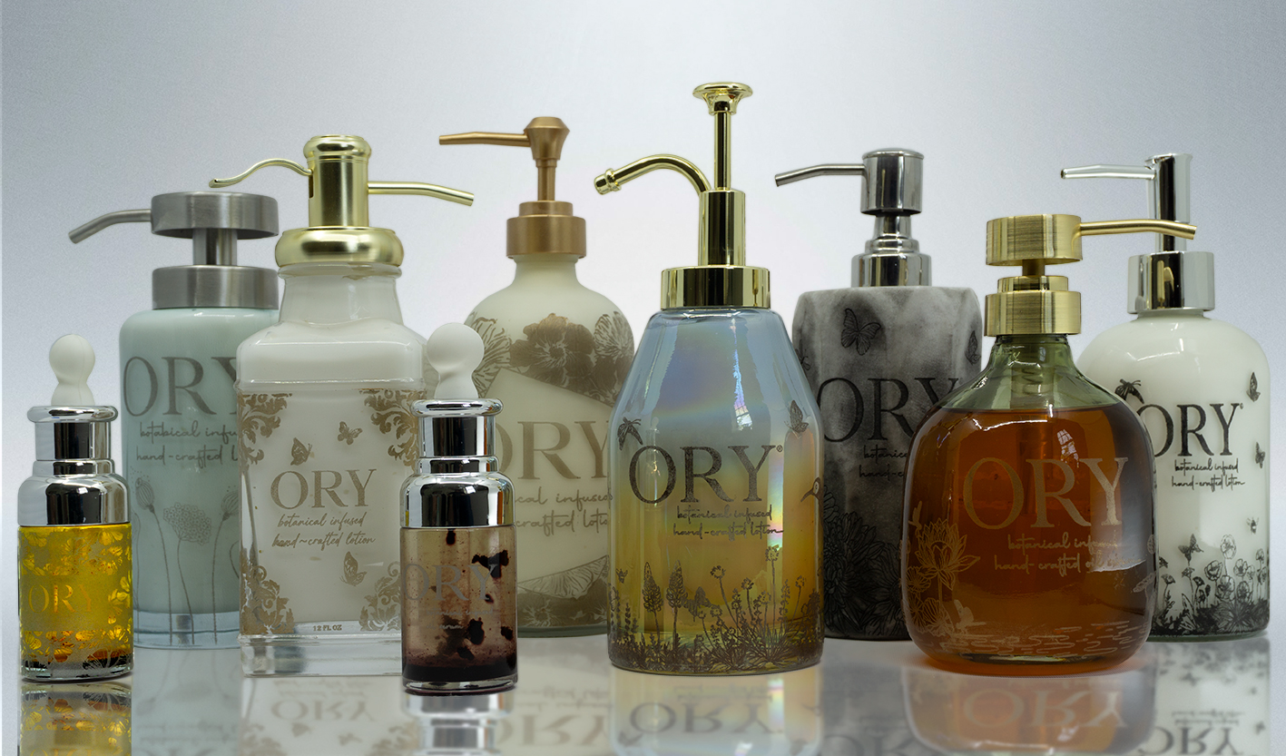 ORY customizable lotion bottles displayed in multiple finishes and pump styles, showcasing personalized botanical-infused skincare packaging options.