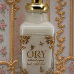 ORY Skincare personalized lotion bottle in rococo style featuring ornate gold detailing, handcrafted botanical-infused lotion, and vintage floral design.
