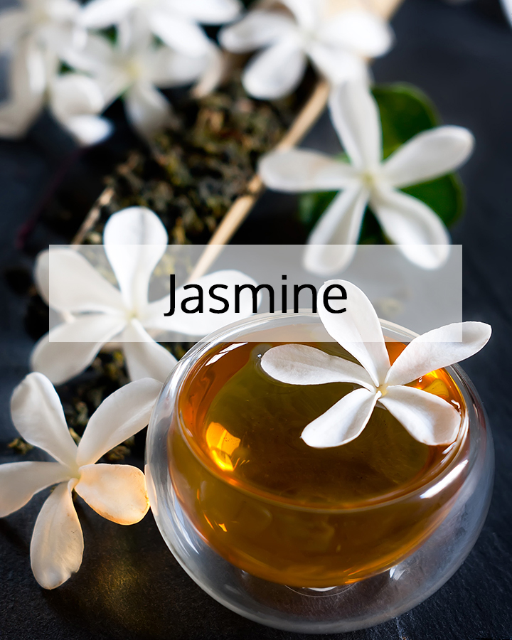 Jasmine blossoms surrounding a golden jasmine infusion oil, highlighting ORY Skincare’s use of jasmine as a soothing, aromatic botanical ingredient for radiant, balanced skin.