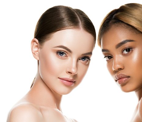 Two women with radiant, healthy skin of different complexions pose side by side, representing ORY Skincare’s inclusive commitment to quality, trust, and customer satisfaction under its return policy.