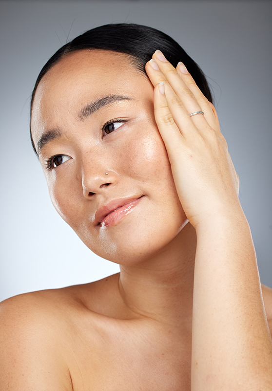 Woman with acne-prone skin showing redness, texture, and blemishes — ORY Skincare solutions for breakout-prone complexions.