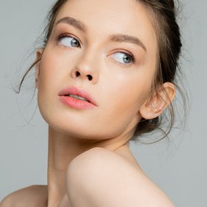 Woman with soft, hydrated complexion representing ORY Skincare cleanser for dry skin formulated to cleanse gently without stripping moisture.