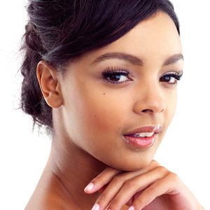 Woman with smooth, radiant complexion — hydrating toner for normal skin by ORY Skincare.