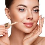 Woman applying hydrating facial serum — lightweight nourishing serum for normal skin by ORY Skincare.